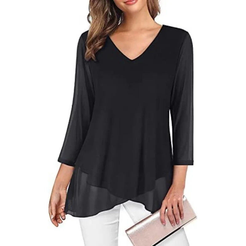 Camicia nera dal taglio morbido e minimal, perfetta per ogni occasione.
