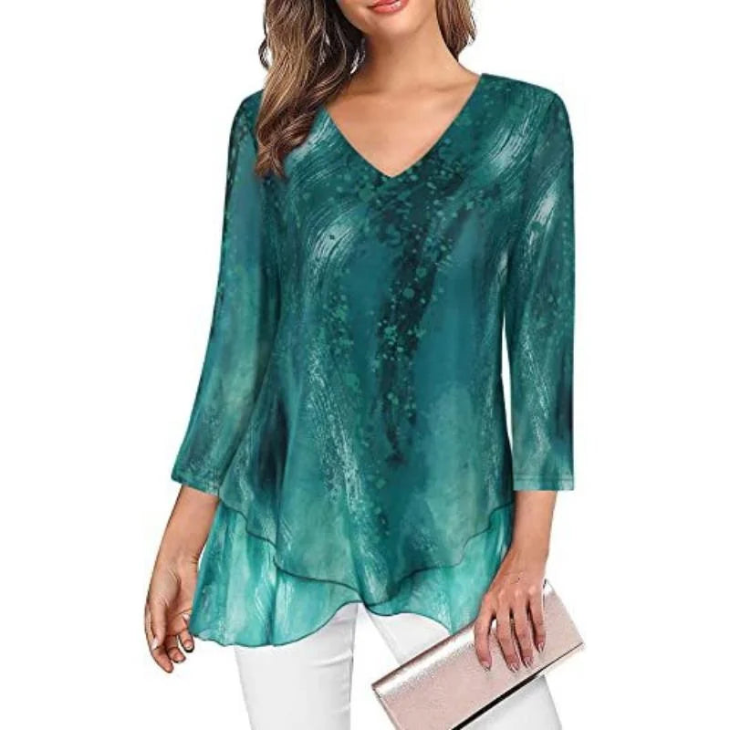 Camicia verde marino dal taglio morbido e minimal, perfetta per ogni occasione.