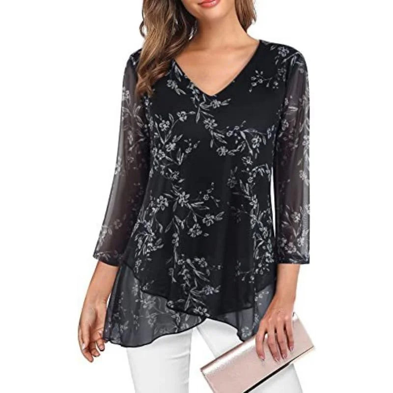 Camicia nera floreale dal taglio morbido e minimal, perfetta per ogni occasione.